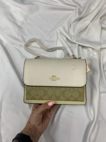 SALE Coach